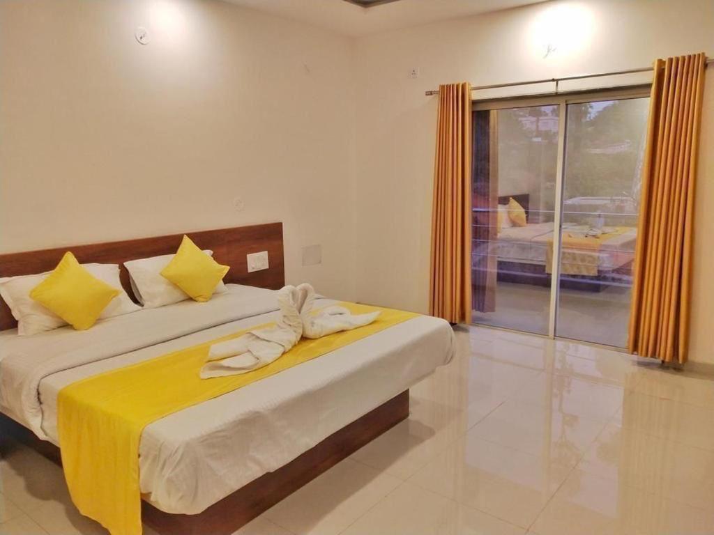 Hotel Magic Mountain,มหาบาเลชวาร์ ภายนอก รูปภาพ