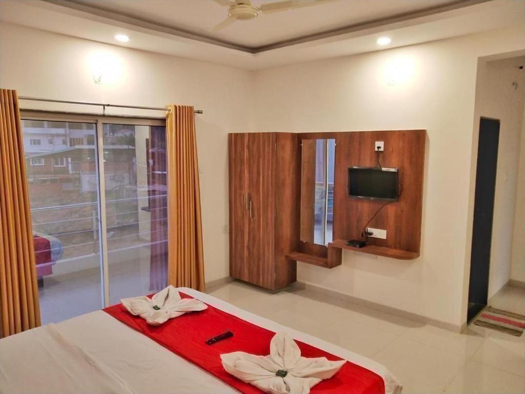 Hotel Magic Mountain,มหาบาเลชวาร์ ภายนอก รูปภาพ